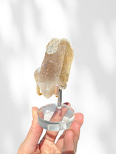 Load image into Gallery viewer, Golden Rutilated Quartz Cluster on stand 03