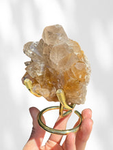 Load image into Gallery viewer, Golden Rutilated Quartz Cluster on stand 02
