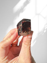 Load image into Gallery viewer, Garnet slightly polished crystals
