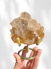 Load image into Gallery viewer, Golden Rutilated Quartz Cluster on stand 02
