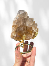 Load image into Gallery viewer, Golden Rutilated Quartz Cluster on stand 02
