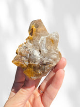 Load image into Gallery viewer, Golden Rutilated Quartz Cluster on stand 01
