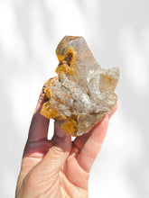 Load image into Gallery viewer, Golden Rutilated Quartz Cluster on stand 01
