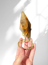 Load image into Gallery viewer, Golden Healer Diamond on stand 02
